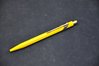 Caran d'Ache 849 Kugelschreiber gelb mit Chromclip