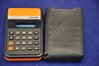 OMRON Electronic Calculator 8PE in orange +Tasche