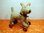Sweet Terrier on wooden rollers