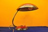 Desk lamp Brand: Helo in red / brass