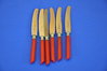 Solingen 6 butter knives red thermoplastic handle 40s