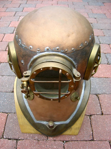 old danish diving helmet with a crown copper