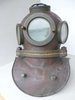 Old unknown diving helmet made of copper brass