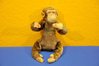 Vintage stuffed toy monkey filled with wood wool