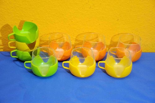 70s design tea glasses with plastic holder colorful