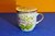 Teacup with lid Sieve lavishly decorated with flowers