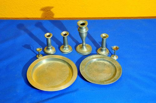 Collection candlestick plates made of pewter 1900-1960